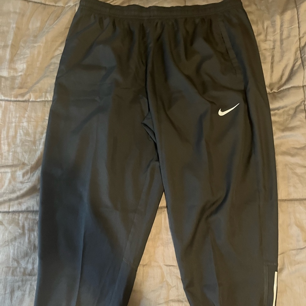 Black Nike track pants